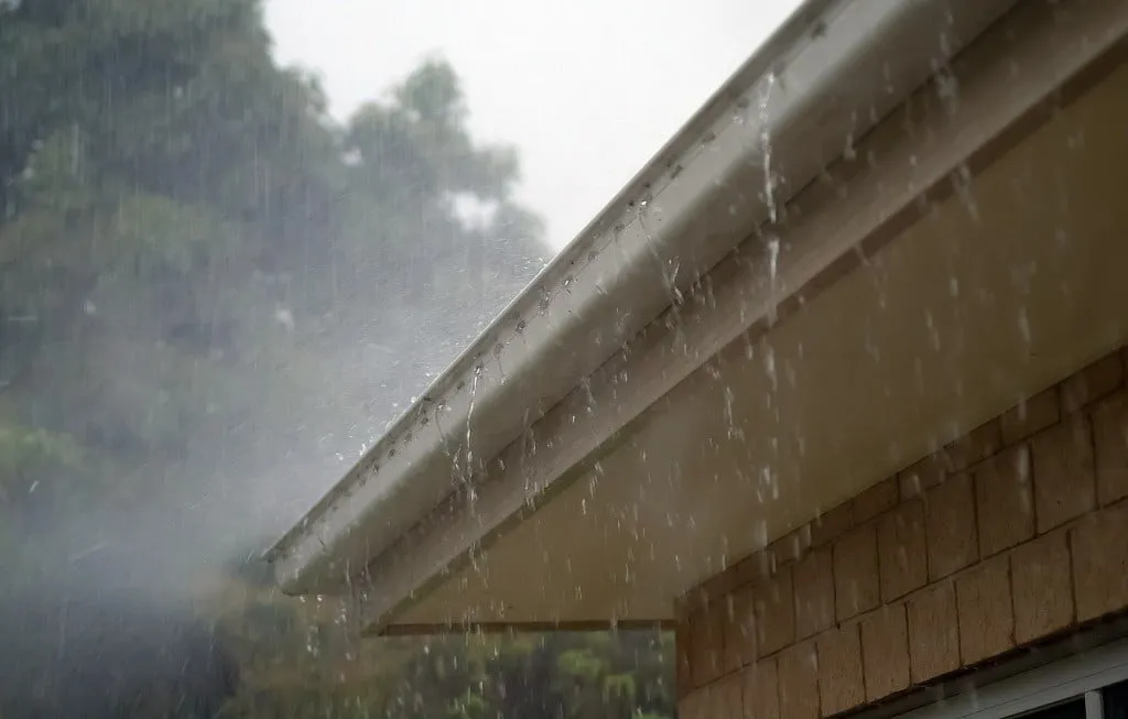 Rain running through a gutter
